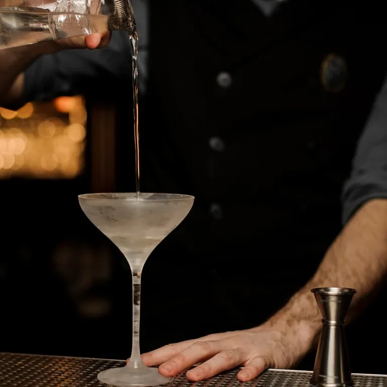 Cocktail being poured at the bar of Repeal Speakeasy in Manassas, VA